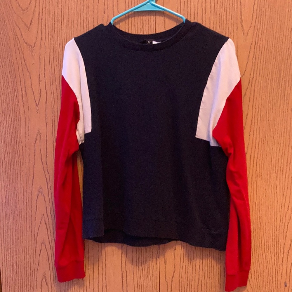 Navy blue, white, and red sweater